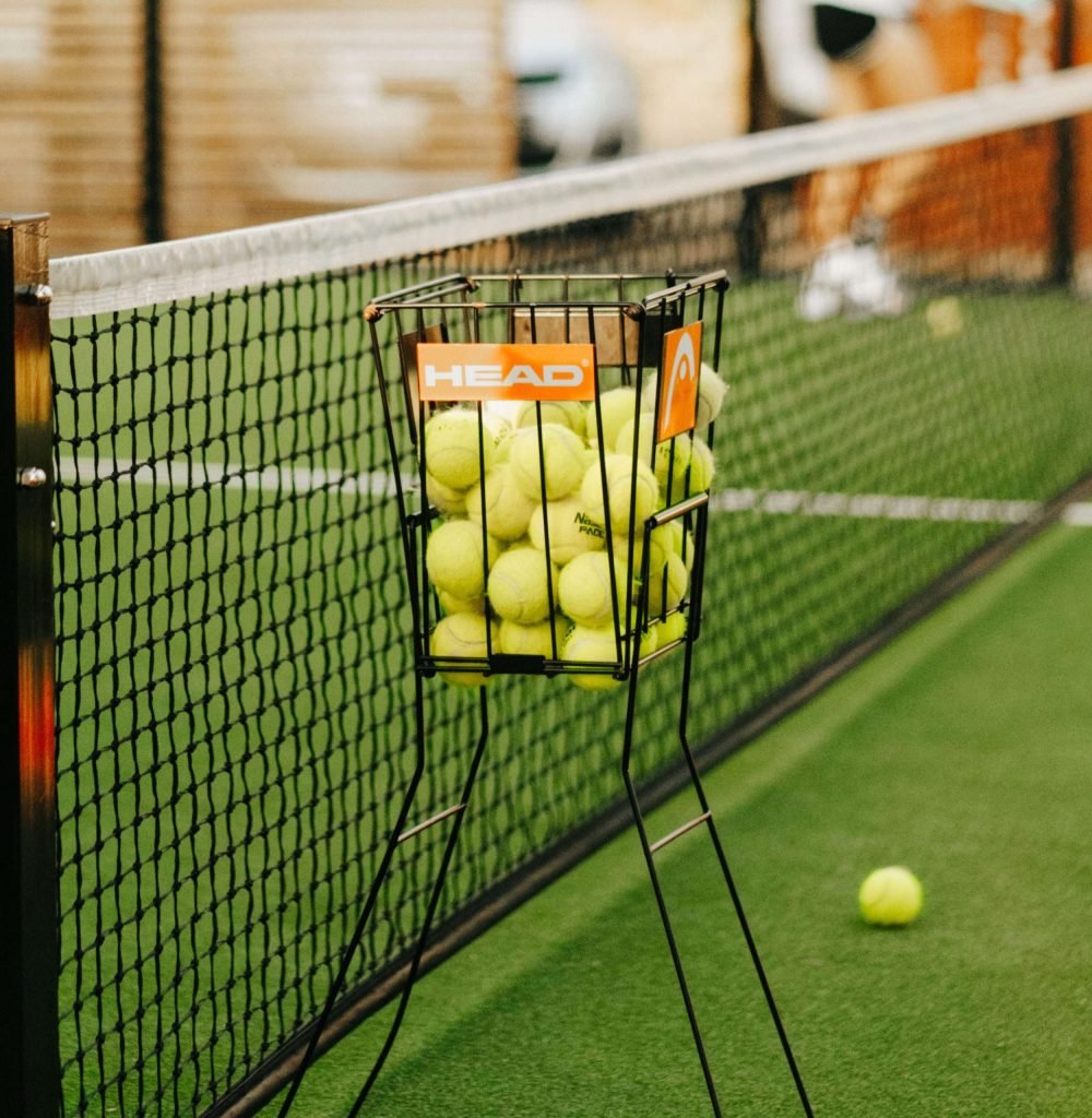 Padel net and balls on a Sanur Padel court